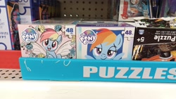 Size: 1920x1080 | Tagged: safe, rainbow dash, pegasus, pony, g4, official, #pony, 48 piece puzzle, blue blush, blushing, dollar tree, hashtag, looking at you, marvel, merchandise, my little pony logo, photo, puzzle, solo, spring