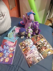 Size: 3024x4032 | Tagged: safe, artist:kuba18i, idw, f'wuffy, spike, twilight sparkle, alicorn, dinosaur, dragon, human, pony, triceratops, friends forever #35, g4, my little pony: friends forever, spoiler:comic02, spoiler:comic21, bed, comic, irl, love live!, love live! school idol project, merchandise, meta, nozomi tojo, photo, plushie, poland, polish, ponies in real life, pony plushie, reading, sosnowiec, twilight sparkle (alicorn)