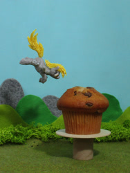 Size: 1383x1844 | Tagged: safe, alternate version, artist:malte279, part of a set, derpy hooves, pony, g4, 3d print, 3d printing pen, craft, cute, derpabetes, flying, food, irl, muffin, photo, sculpture, solo, that pony sure does love muffins