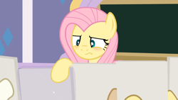 Size: 1280x720 | Tagged: safe, artist:agrol, fluttershy, pegasus, pony, g4, art class, blushing, chalkboard, female, fluttershy is not amused, friendship student, mare, school of friendship, the element of kindness, this will end in detention, unamused