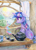 Size: 860x1200 | Tagged: safe, artist:maytee, twilight sparkle, pony, unicorn, g4, colored pencil drawing, cottagecore, cup, female, floppy ears, mare, scenery, sitting, solo, teacup, teapot, traditional art, unicorn twilight, window