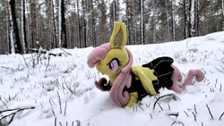 Size: 1191x671 | Tagged: safe, artist:mgrdash, fluttershy, bat pony, pony, g4, bat ponified, clothes, dress, flutterbat, forest, irl, photo, plushie, ponies in real life, race swap, snow, solo, winter