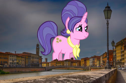 Size: 2047x1356 | Tagged: safe, anonymous editor, artist:thebosscamacho, edit, cookie crumbles, pony, unicorn, g4, clothes, ear piercing, female, giant pony, giant unicorn, giantess, highrise ponies, irl, italy, jewelry, macro, mare, mega giant, photo, piercing, pisa, ponies in real life, scarf, smiling, solo