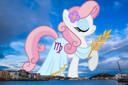 Size: 2047x1365 | Tagged: safe, edit, editor:jaredking779, virgo (g4), earth pony, pony, g4, clothes, dress, eyes closed, eyeshadow, female, flower, flower in hair, giant pony, giantess, highrise ponies, irl, kristiansund, macro, makeup, mare, norway, photo, ponies in real life, ponyscopes, raised hoof, smiling, solo, virgo