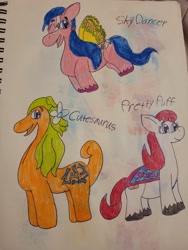 Size: 4032x3024 | Tagged: safe, artist:mintwhistle, derpibooru exclusive, cutesaurus, pretty puff, sky dancer, dinosaur, earth pony, pony, g1, g5, blaze (coat marking), bow, coat markings, colored pencil drawing, facial markings, female, flying, g1 to g5, generation leap, hair bow, looking back, mare, old art, one eye closed, open mouth, open smile, redesign, saddle, sketchbook, smiling, summer wing ponies, summerwing ponies, tack, traditional art, trio, unshorn fetlocks, wink