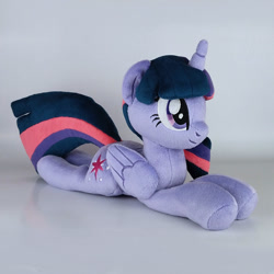 Size: 1000x1000 | Tagged: safe, twilight sparkle, alicorn, pony, g4, folded wings, irl, lying down, merchandise, photo, plushie, prone, solo, twilight sparkle (alicorn), wings