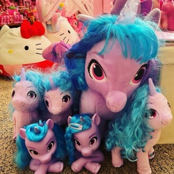 Size: 705x705 | Tagged: safe, izzy moonbow, pinkie pie, cat, earth pony, human, pony, unicorn, equestria girls, g4, g5, cute, female, hairclip, hello kitty, irl, izzybetes, mare, moonburst of izzies, multeity, photo, plushie, sanrio, self paradox, self ponidox, too much pink energy is dangerous