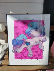 Size: 4000x3000 | Tagged: safe, artist:annuthecatgirl, izzy moonbow, pony, unicorn, g5, female, framed picture, heart, heart background, mare, pink background, signature, simple background, solo, traditional art, unshorn fetlocks