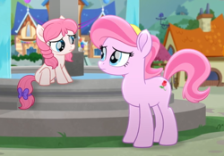 Size: 449x314 | Tagged: safe, screencap, tulip bulb, tulip rose, earth pony, pony, g4, my little pony: rainbow roadtrip, anatomically incorrect, bow, cropped, duo, female, filly, foal, fountain, hope hollow, house, incorrect leg anatomy, looking at each other, looking at someone, mare, mother and child, mother and daughter, outdoors, raised hoof, sad, sitting, tail, tail bow, water