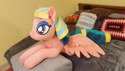 Size: 4032x2268 | Tagged: safe, artist:ponimalion, somnambula, pegasus, pony, g4, bedroom eyes, cute, egyptian, egyptian headdress, egyptian pony, female, fluffy mane, fluffy tail, irl, mare, photo, plushie, smiling, solo, spread wings, tail, wings