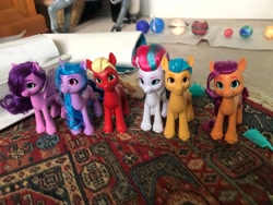 Size: 4032x3024 | Tagged: safe, hitch trailblazer, izzy moonbow, pipp petals, sprout cloverleaf, sunny starscout, zipp storm, earth pony, pegasus, pony, unicorn, g5, brushable, comb, female, irl, male, mane five, mare, photo, sprout joins the mane five, stallion, toy