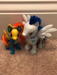 Size: 3024x4032 | Tagged: safe, soarin', spitfire, pegasus, pony, g4, best friends, carpet, clothes, cute, duo, duo male and female, female, irl, male, mare, not shipping, photo, spread wings, stallion, toy, uniform, wings, wonderbolts, wonderbolts uniform