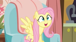 Size: 2129x1186 | Tagged: safe, screencap, fluttershy, pegasus, pony, discordant harmony, g4, chair, curtains, excited, female, happy, kitchen, living room, mare, sink, sitting, solo, spread wings, wings