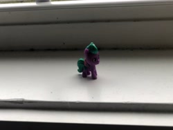 Size: 4032x3024 | Tagged: safe, maverick mauve, pegasus, pony, g5, high angle, irl, male, mini world magic, photo, side view, smol, solo, stallion, toy, windowsill