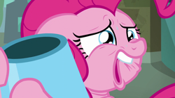 Size: 1280x720 | Tagged: safe, screencap, pinkie pie, earth pony, pony, g4, the gift of the maud pie, debating, faic, female, floppy ears, hug, lip bite, manehattan, party cannon, sad, sentimental value, solo, sweat