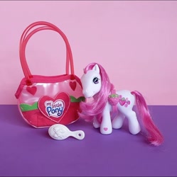 Size: 719x722 | Tagged: safe, strawberry swirl, earth pony, pony, g3, 2000s, female, food, irl, merchandise, my little pony logo, photo, solo, strawberry, toy