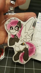 Size: 1152x2048 | Tagged: safe, artist:inkkeystudios, oc, oc only, pegasus, pony, badge, looking at you, photo, smiling, solo, spread wings, traditional art, wings