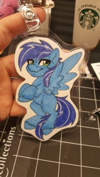 Size: 1152x2048 | Tagged: safe, artist:inkkeystudios, oc, oc only, pegasus, pony, badge, lidded eyes, looking at you, photo, smiling, smug, solo, spread wings, traditional art, unshorn fetlocks, wings