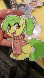 Size: 1152x2048 | Tagged: safe, artist:inkkeystudios, oc, oc only, earth pony, pony, badge, clothes, eye clipping through hair, happy, photo, solo, sweater, traditional art, turtleneck