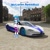 Size: 1078x1078 | Tagged: safe, edit, editor:scitwisparkle42, dj pon-3, vinyl scratch, human, equestria girls, g4, car, forza horizon, forza horizon 4, game screencap, mclaren, mclaren speedtail, solo, video game