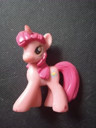 Size: 3120x4160 | Tagged: safe, photographer:hollyn, cinnamon breeze (g4), pony, unicorn, g4, blind bag, blind bag pony, irl, photo, solo, toy