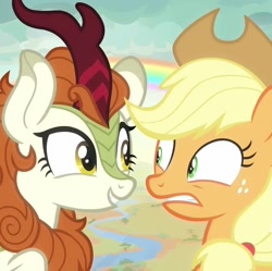 Size: 1086x1080 | Tagged: safe, screencap, applejack, autumn blaze, earth pony, kirin, pony, g4, season 8, sounds of silence, a kirin tale, cropped, duo, duo female, eye contact, female, looking at each other, looking at someone, mare, rainbow, singing, uneasy