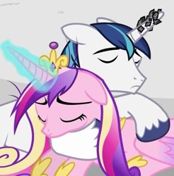 Size: 387x393 | Tagged: safe, screencap, princess cadance, shining armor, alicorn, pony, unicorn, g4, the crystal empire, eyes closed, female, floppy ears, glowing, glowing horn, horn, horn crystals, hug, magic suppression, male, mare, stallion