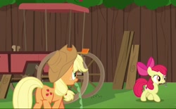 Size: 650x404 | Tagged: safe, screencap, apple bloom, applejack, earth pony, pony, g4, the cart before the ponies, applebutt, butt, duo, female, filly, foal, mare, mouth hold, plot