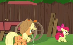 Size: 650x404 | Tagged: safe, screencap, apple bloom, applejack, earth pony, pony, g4, my little pony: friendship is magic, the cart before the ponies, applebutt, butt, duo, female, filly, foal, mare, mouth hold, plot