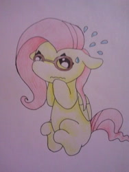 Size: 480x640 | Tagged: safe, artist:fluttersdoodles, fluttershy, pegasus, pony, g4, embarrassed, female, floppy ears, glasses, sitting, solo, sweat, traditional art