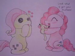 Size: 640x480 | Tagged: safe, artist:fluttersdoodles, fluttershy, pinkie pie, pegasus, pikachu, pony, g4, dialogue, eyes closed, heart, hooves on cheeks, plushie, pokémon, sitting, smiling, traditional art