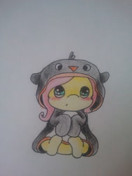 Size: 480x640 | Tagged: safe, artist:fluttersdoodles, fluttershy, pegasus, pony, g4, blushing, clothes, costume, female, kigurumi, looking at you, pajamas, sitting, solo, traditional art