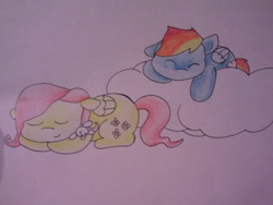 Size: 640x480 | Tagged: safe, artist:fluttersdoodles, fluttershy, rainbow dash, pegasus, pony, g4, cloud, duo, eyes closed, female, lesbian, lying down, lying on a cloud, on a cloud, prone, ship:flutterdash, shipping, sleeping, traditional art