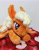 Size: 2339x3027 | Tagged: safe, artist:basil_leafeon, applejack, bat pony, pony, g4, applebat, bat ponified, bat wings, beanie (plushie), female, high res, irl, lying down, mare, photo, plushie, prone, race swap, wings