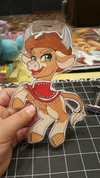 Size: 5312x2988 | Tagged: safe, artist:inkkeystudios, oc, oc only, cow, badge, clothes, cloven hooves, cowboy hat, hat, looking at you, open mouth, open smile, photo, poncho, smiling, solo, traditional art