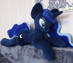 Size: 2048x1749 | Tagged: safe, artist:mdcraft10, princess luna, alicorn, pony, g4, female, folded wings, horn, irl, lying down, mare, photo, plushie, prone, safe. solo, wings