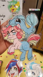 Size: 5312x2988 | Tagged: safe, artist:inkkeystudios, oc, oc only, earth pony, fish, pony, ahegao, badge, frown, looking at you, open mouth, photo, smiling, solo focus, tongue out, traditional art, unamused