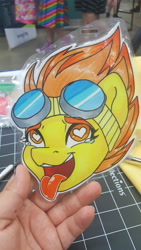Size: 5312x2988 | Tagged: safe, artist:inkkeystudios, spitfire, human, pony, g4, ahegao, badge, bust, eyes rolling back, goggles, goggles on head, heart, heart eyes, irl, irl human, open mouth, open smile, photo, portrait, smiling, solo, teary eyes, tongue out, traditional art, wingding eyes