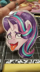 Size: 5312x2988 | Tagged: safe, artist:inkkeystudios, starlight glimmer, human, pony, unicorn, g4, ahegao, badge, bust, eye clipping through hair, eyes rolling back, heart, heart eyes, irl, irl human, open mouth, open smile, photo, portrait, smiling, solo, tongue out, traditional art, wingding eyes