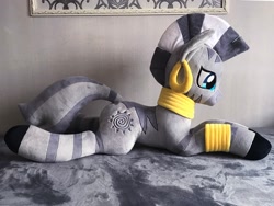 Size: 2048x1536 | Tagged: safe, artist:mdcraft10, zecora, zebra, g4, bed, ear piercing, earring, female, indoors, irl, jewelry, lying down, lying on bed, mare, on bed, photo, piercing, plushie, prone, solo