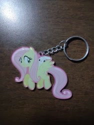 Size: 972x1296 | Tagged: safe, angel bunny, fluttershy, pegasus, pony, rabbit, g4, animal, cute, eyes open, female, irl, keychain, mare, merchandise, photo, wings