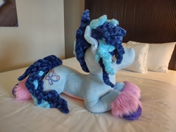 Size: 2048x1536 | Tagged: safe, artist:gleamydreams, misty brightdawn, pony, unicorn, g5, bed, irl, photo, plushie, solo