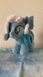 Size: 720x1280 | Tagged: safe, artist:melodisde, oc, oc:snowdrop, pegasus, pony, blind, bow, commission, female, filly, foal, folded wings, happy, irl, photo, plushie, smiling, solo, standing, wings