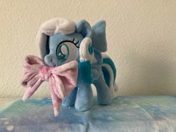 Size: 1280x960 | Tagged: safe, artist:melodisde.snowdrop, pegasus, pony, blind, bow, commission, female, filly, foal, folded wings, happy, irl, photo, plushie, smiling, solo, standing, wings