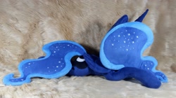 Size: 4096x2289 | Tagged: safe, artist:doctorkoda, princess luna, alicorn, pony, g4, commission, female, folded wings, horn, irl, lying down, mare, peytral, photo, plushie, prone, solo, wings