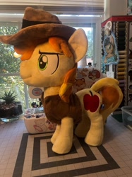 Size: 1078x1440 | Tagged: safe, artist:emberfallplush, braeburn, earth pony, pony, g4, clothes, hat, irl, male, photo, plushie, smiling, solo, stallion, standing, vest