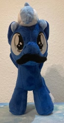 Size: 559x1072 | Tagged: safe, artist:melodisde, oc, oc only, pegasus, pony, commission, facial hair, female, filly, foal, irl, moustache, photo, plushie, solo, spread wings, standing, wings