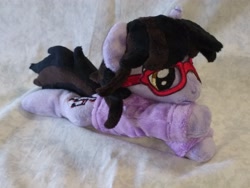 Size: 4096x3072 | Tagged: safe, artist:bluedragonflyplush, pony, unicorn, beanie (plushie), brendon urie, clothes, commission, glasses, hoodie, horn, irl, lying down, male, panic! at the disco, photo, plushie, ponified, prone, shirt, solo, stallion, t-shirt