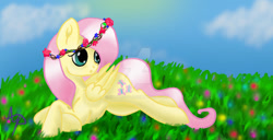 Size: 1024x524 | Tagged: safe, artist:nutmeg04, fluttershy, pegasus, pony, g4, female, field, floral head wreath, flower, looking back, lying down, mare, prone, solo