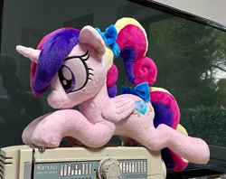 Size: 2048x1624 | Tagged: safe, artist:rtryart, princess cadance, alicorn, pony, g4, bow, female, folded wings, horn, irl, lying down, mare, photo, plushie, prone, solo, teen princess cadance, wings